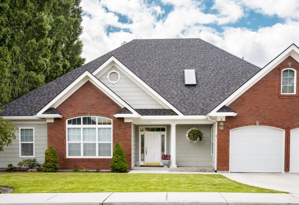 Modern home with new shingle roof