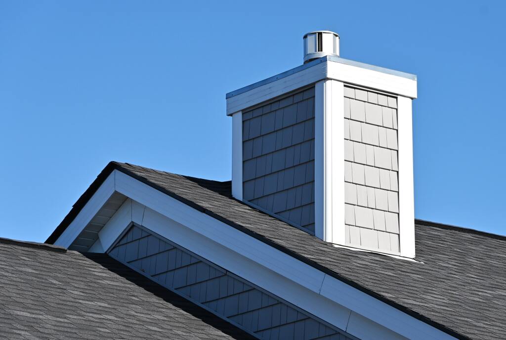 Chimney on a shingle roof