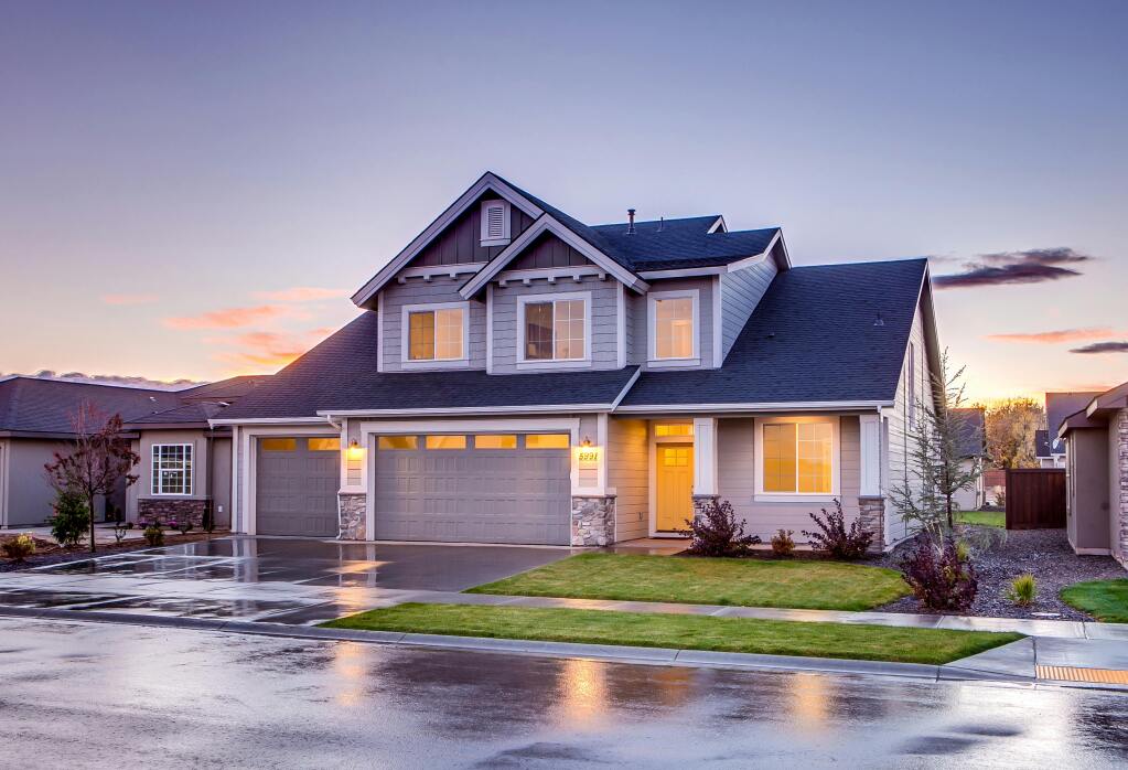 Modern house with lights at dusk