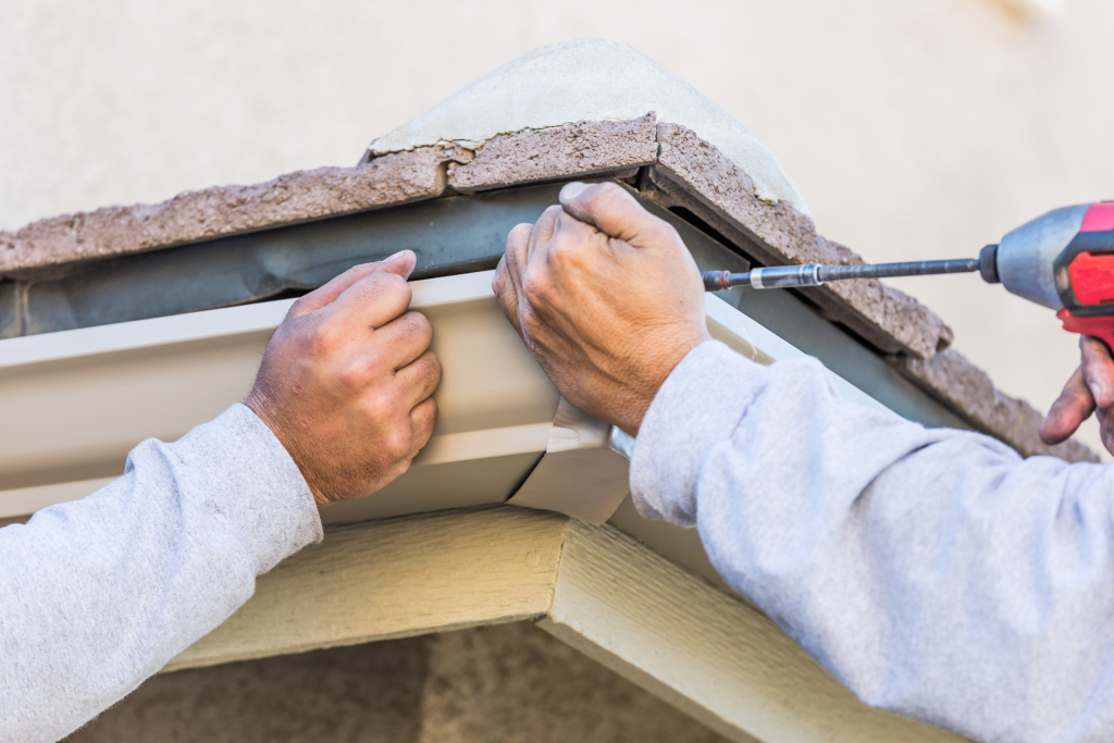 Installing gutter on a roof