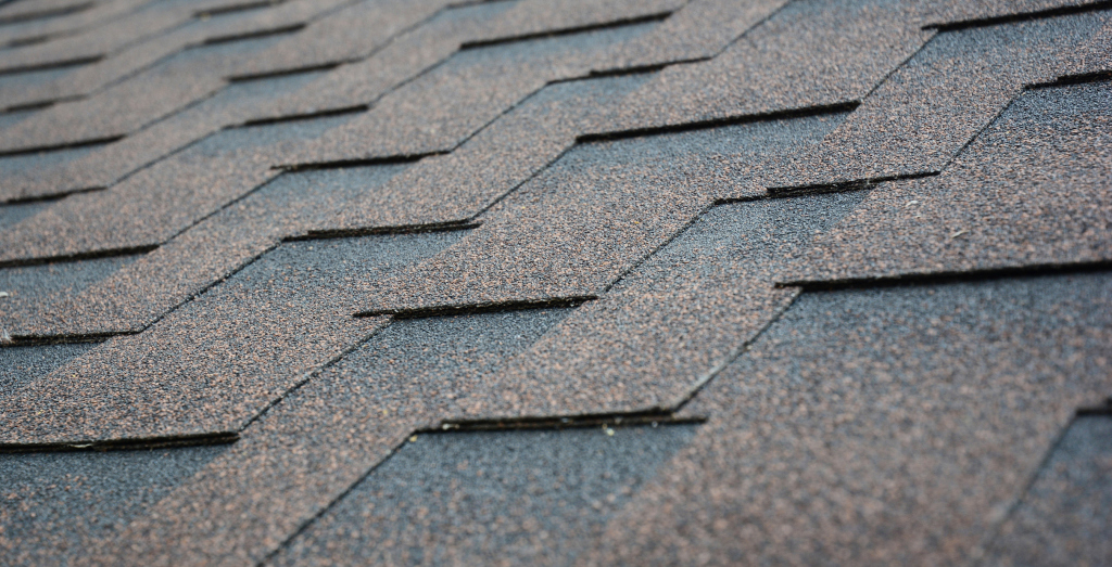 Close-up of textured roof shingles.