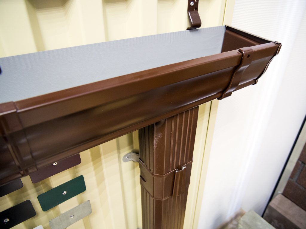 Brown gutter system display on wall